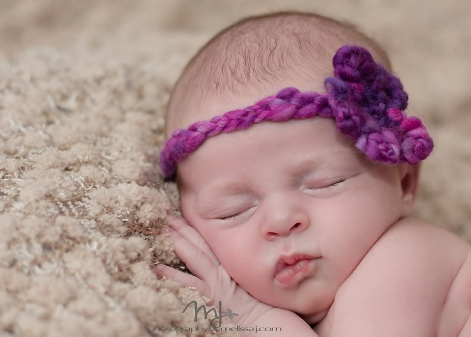 newborn girl with purple headband, www.photogrpahybymelissaj.com www.facebook.com/photographybymelissaj