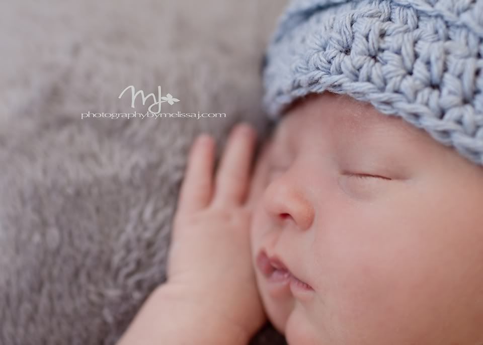 newborn boy in newsboy hat, www.photographybymelissaj.com  www.facebook.com/photographybymelissaj