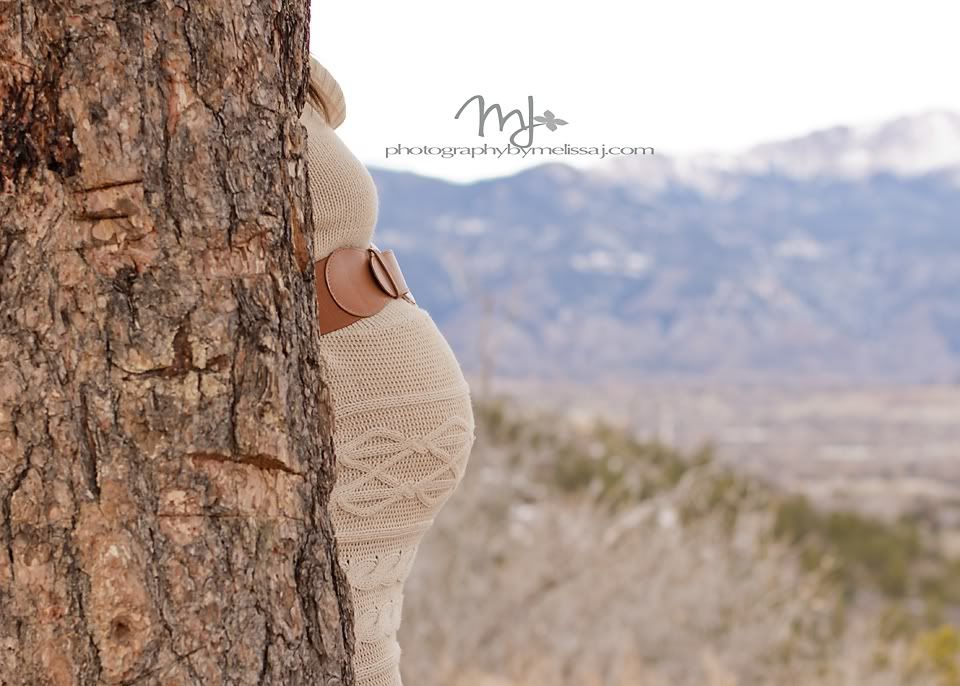 there's the cute belly =), www.photographybymelissaj.com www.facebook.com/photographybymelissaj