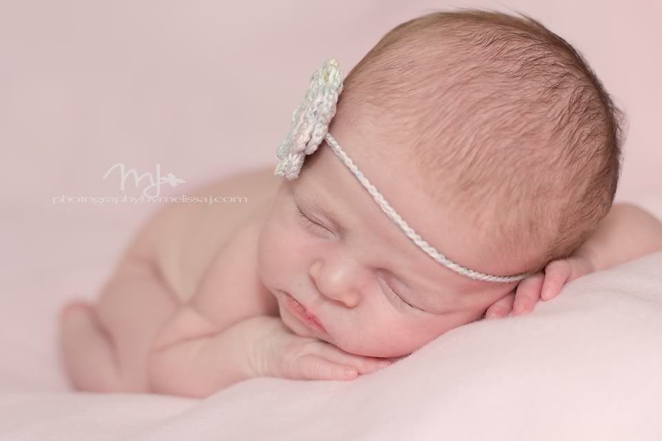 sweet newborn girl with simple headband, www.photogrpahybymelissaj.com www.facebook.com/photographybymelissaj