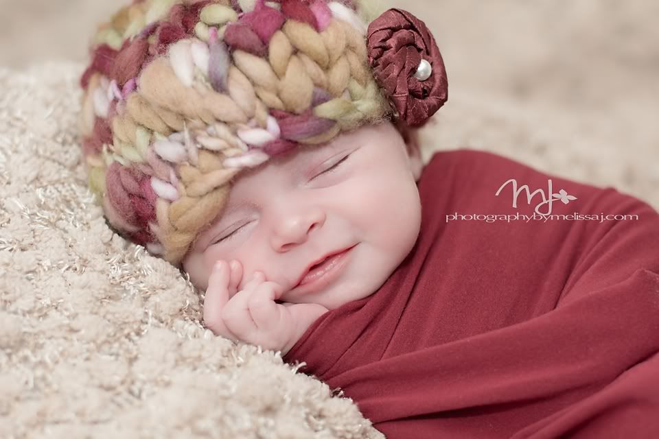 newborn girl wrapped with hat made by &quot;raspberry and lime&quot;, www.photogrpahybymelissaj.com www.facebook.com/photographybymelissaj
